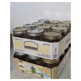 24 wide mouth pint mason jars. K44