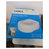 Raised toilet seat new in box. 7-1