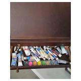 Artist painting set up and books. 45-68