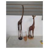 Wooden carved Giraffes and blown glass. 45-85