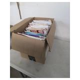 Box full of sewing patterns. 8-13