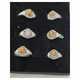 6 sterling silver rings. 25-43