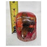Large moth encased in amber. 25-11