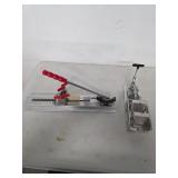 Stainless steel clipper and pen press. 11-28