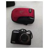 Samsung digital camera with case. 11-13