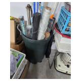 Trash can full of gardening supply & more. 19-34