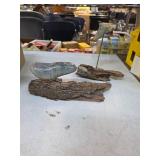 Whale and dolphin stone carvings. 20-4