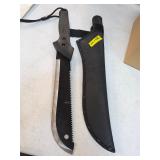 Large sawback survival knife. 20-12