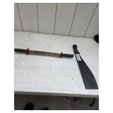Bark skinner and heavy machete. 19-74