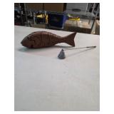 Wood puzzle fish and candle douser. S-23