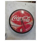 Vintage Coca-Cola clock 14in diameter. B-17