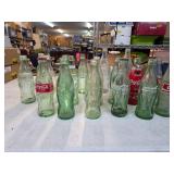Vintage Coca-Cola bottle collection. B-16