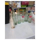 Vintage Coca-Cola bottle collection. B-63