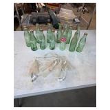 Vintage Coca-Cola bottles and lights. B-80