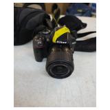 Nikon D3300 DSLR camera. 100-3
