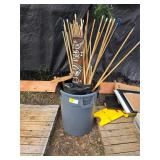 can full of pool cues and accessories. lot 117