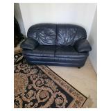 Leather loveseat in great condition. D-86