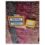 Metal Lionel trains sign and frame. D421