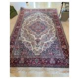 looks like a Persian rug about 9x7ft no tag. D337