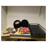 Contents of shelf, African items, more. D464