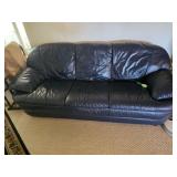 Leather couch in great condition. D84