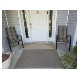 two patio chairs. D637
