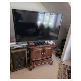TV, cabinet and contents. D-87