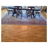 appears to be a handmade Persian rug. D-34