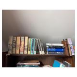 Books on top of case. D282