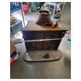 Cast iron wood stove. 1-74