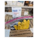 Box full of various types of gloves. 1-65