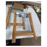 Camp chairs and ironing board. 1-49