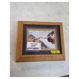 gun holder behind picture. 21-8