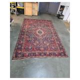 Vintage hand knotted Persian mashad wool rug. 7-5