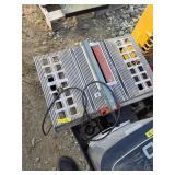 10-inch motorized bench saw. N13