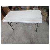 Folding 4 ft table. 1-10