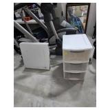 Folding table and plastic shelving unit. K5