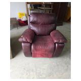 Rocking recliner maroon colored. 55-79