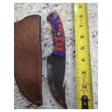 8in blade with gut hook and sheath. M12