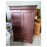 Cabinet 71in tall, 44in wide, 23in deep. 55-70