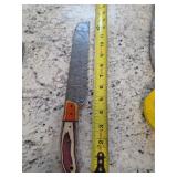 13.5in serrated Damascus blade. M6