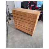 Narrow dresser for plans or tools. 1-11