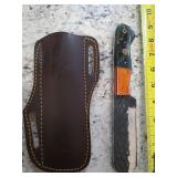 8.5in blade with sheath. M20