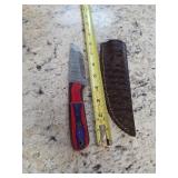 8in Damascus blade with sheath. M16