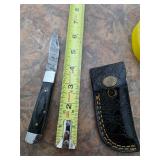 Folding Damascus knife with belt sheath. M11