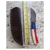 8in Damascus blade with sheath. M11