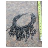 Gunmetal tone statement skull necklace. 17-16