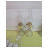 two vintage hurricane lamps. 56-1