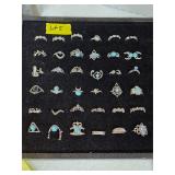 Costume jewelry rings of various sizes. 5-65