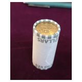 Unsearched 25 dollar roll of 1-dollar coins. 5-28